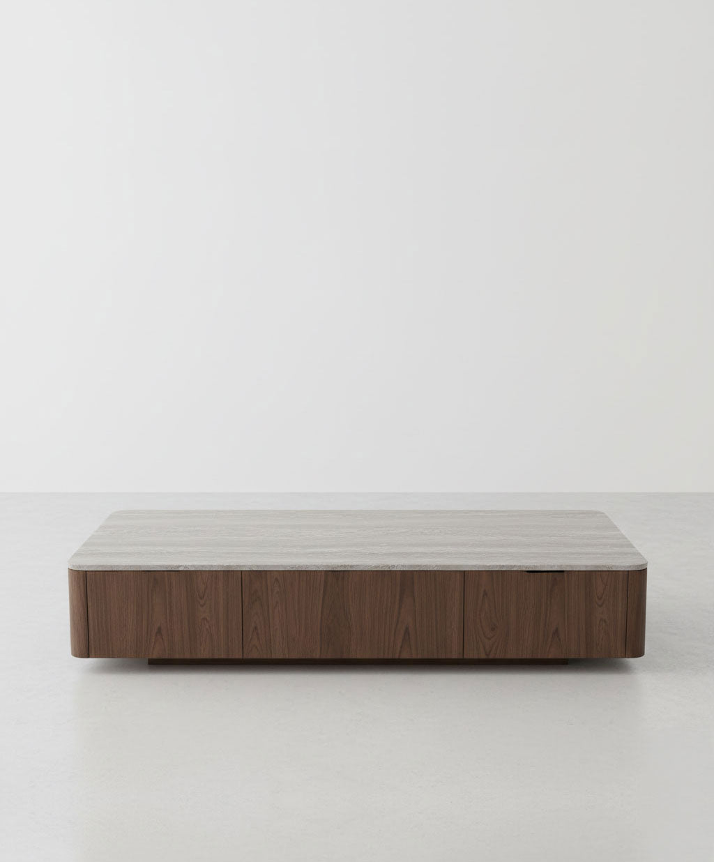 Coffee table with wooden base and gray top on a white background