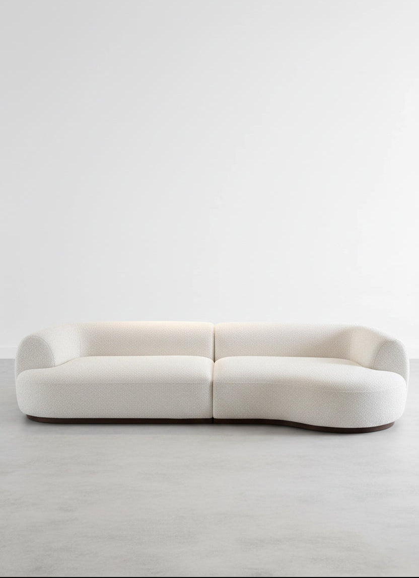 Modern white sofa on a light gray background