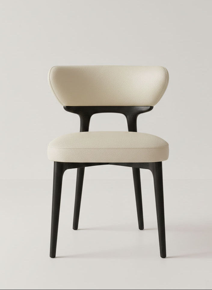Beige chair with black legs on a light gray background